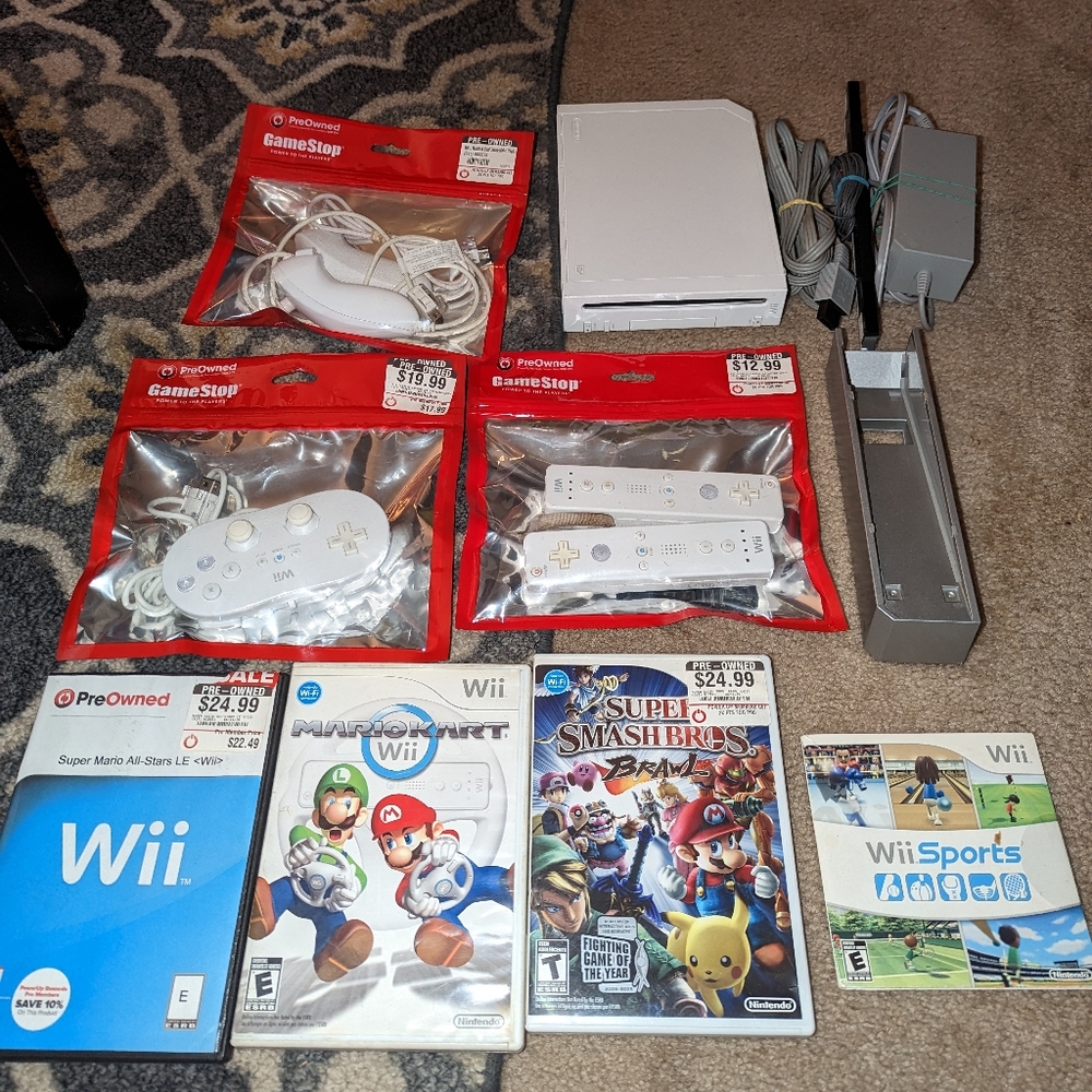 Nintendo Wii with multiple controllers and games